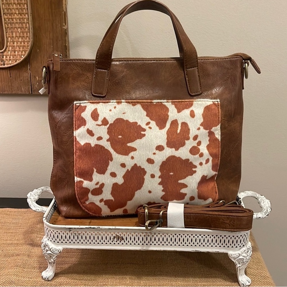 Beautiful new with tags purse and crossbody strap.